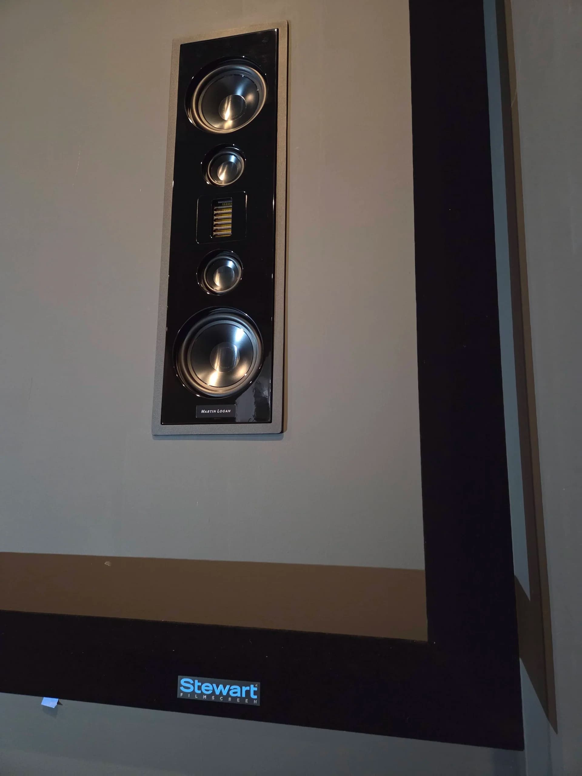 Stewart Filmscreen frame detail with in-wall speaker integration