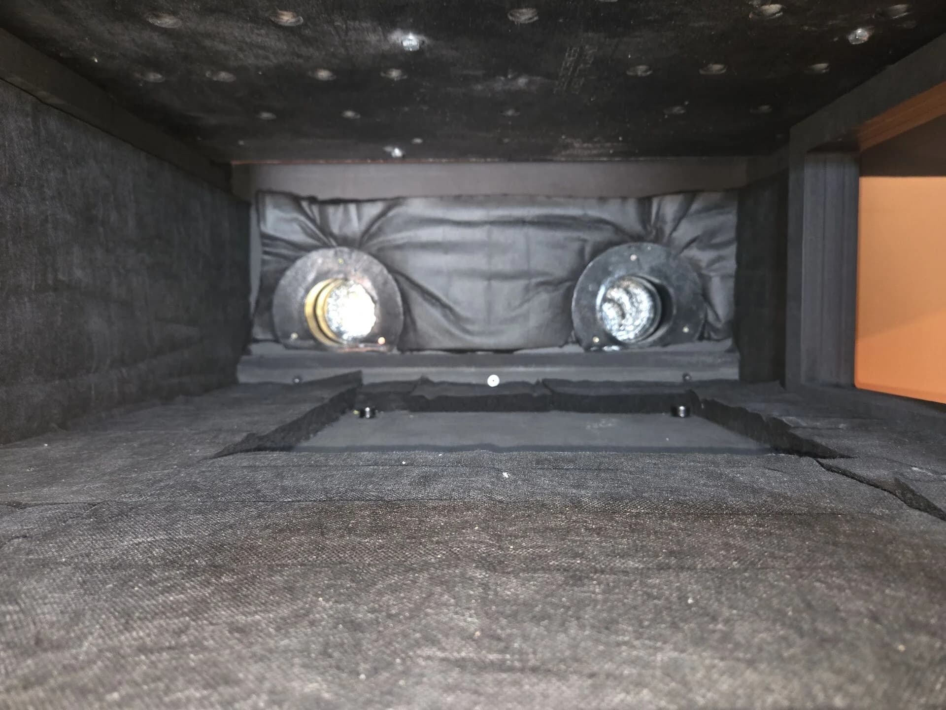 Inside: the two duct ports and the acoustic lining
