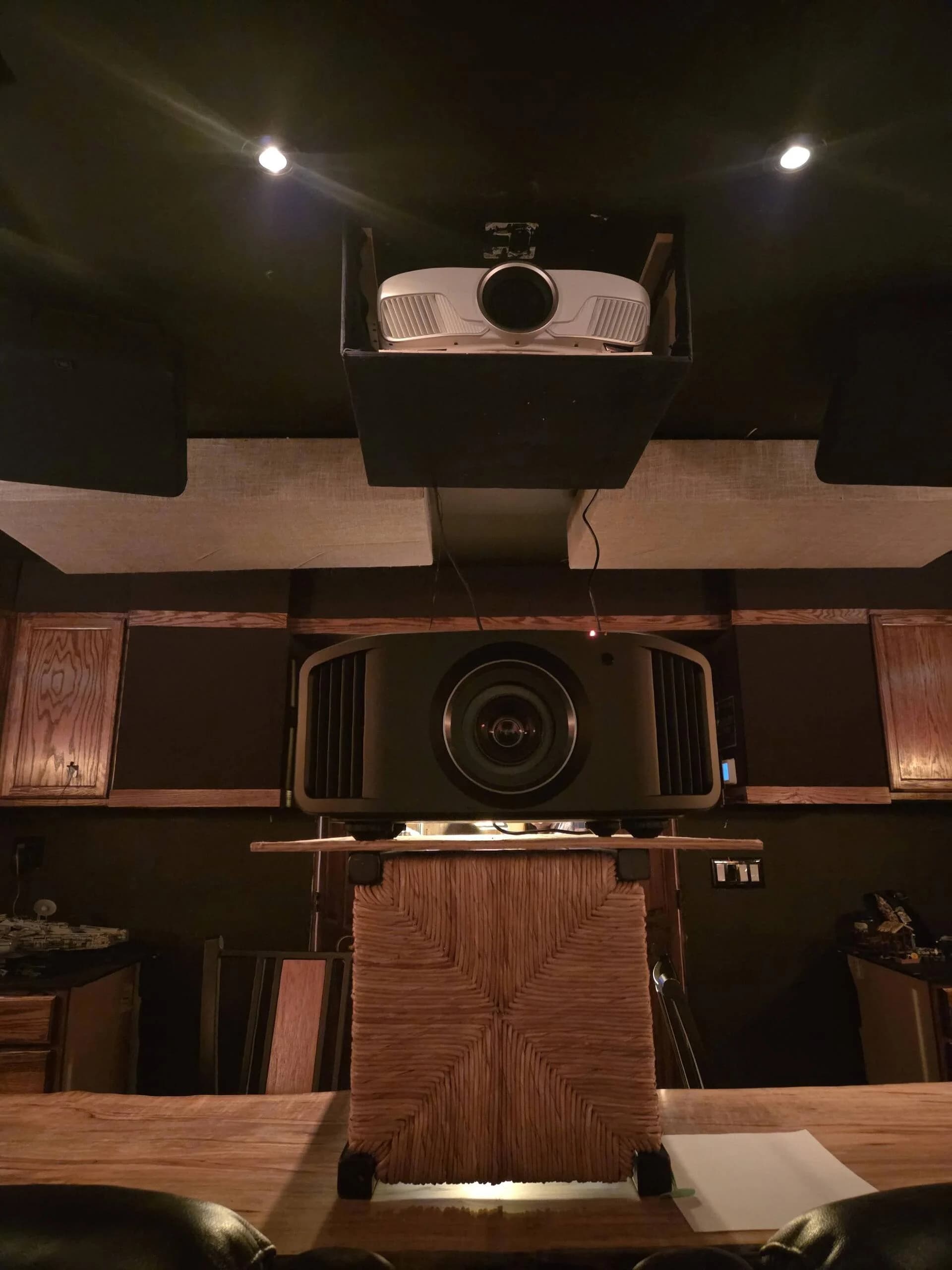 Side-by-side demo: Epson 5050 ceiling-mounted above the JVC NZ7 on temporary stand