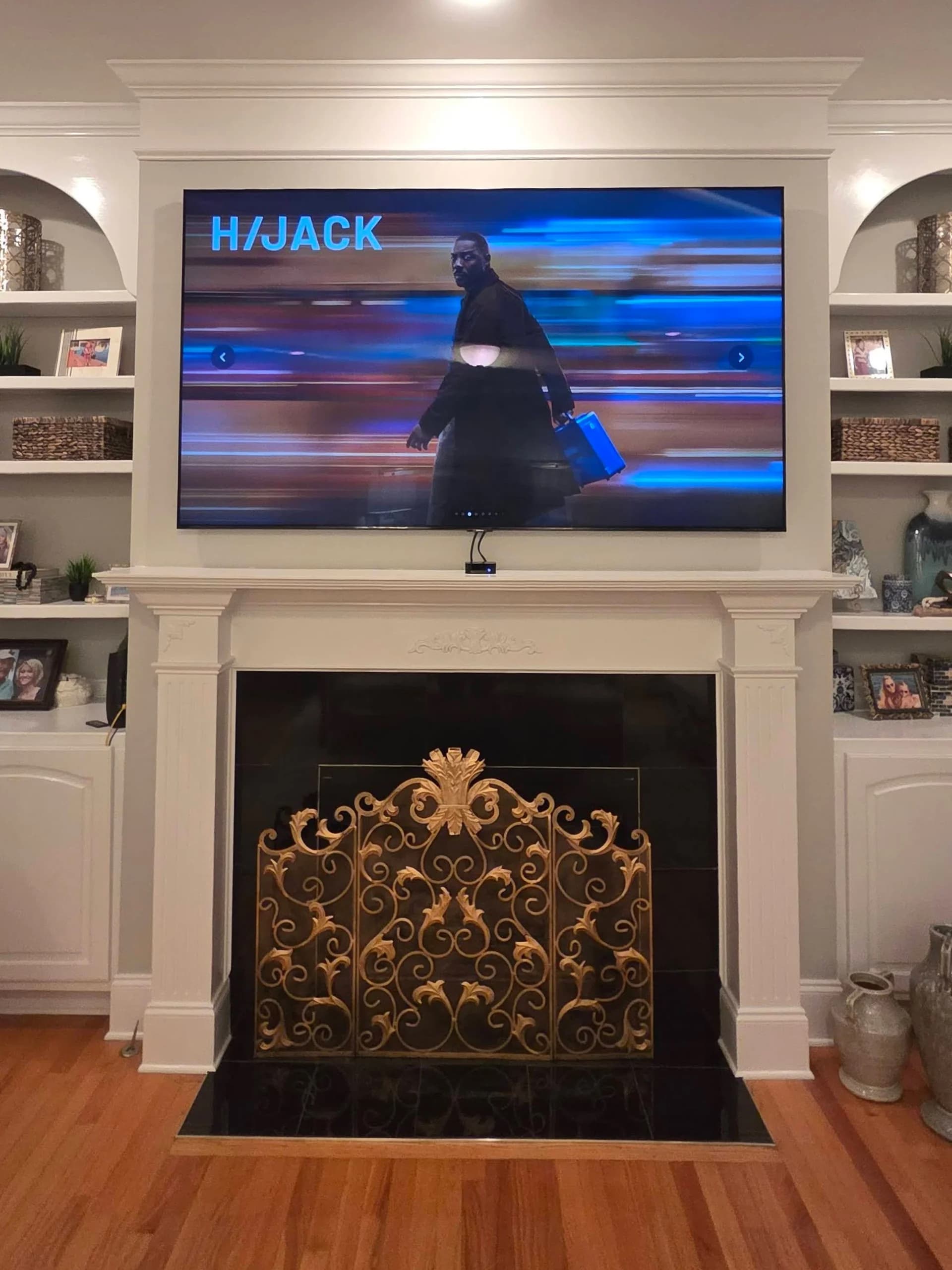 Fireplace and TV detail — screen on